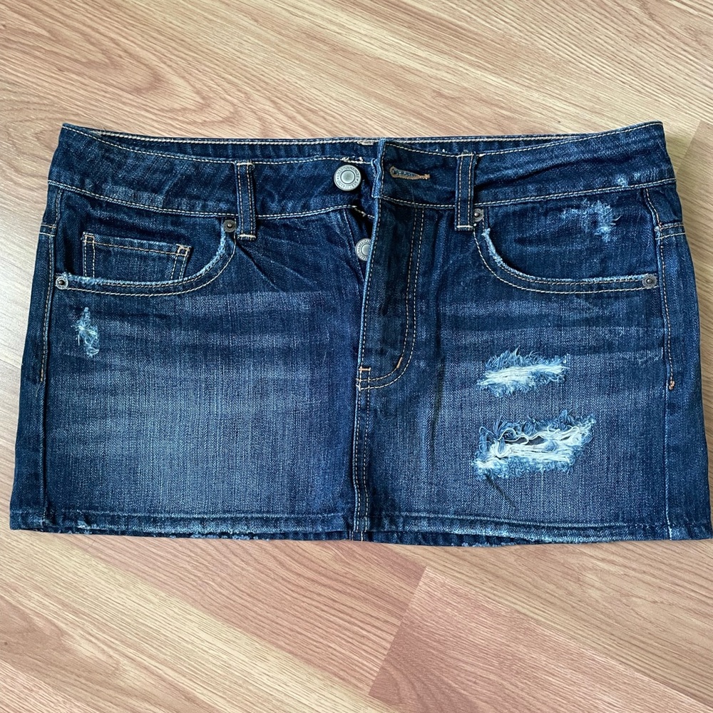American Eagle - Button fly jean mini skirt, size 6.